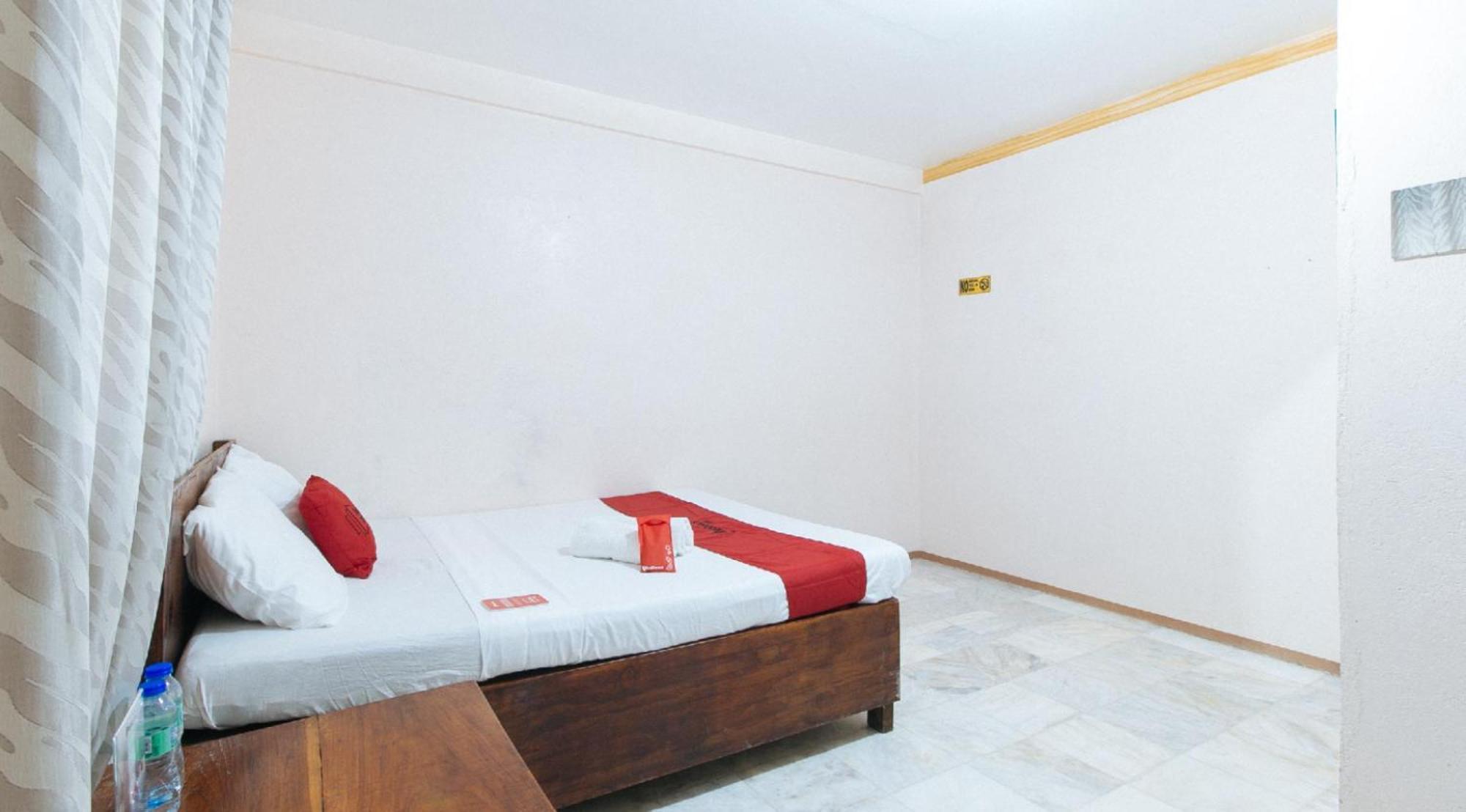 Reddoorz Hostel At Megans Paradisio Beach Resort サン・アントニオ エクステリア 写真